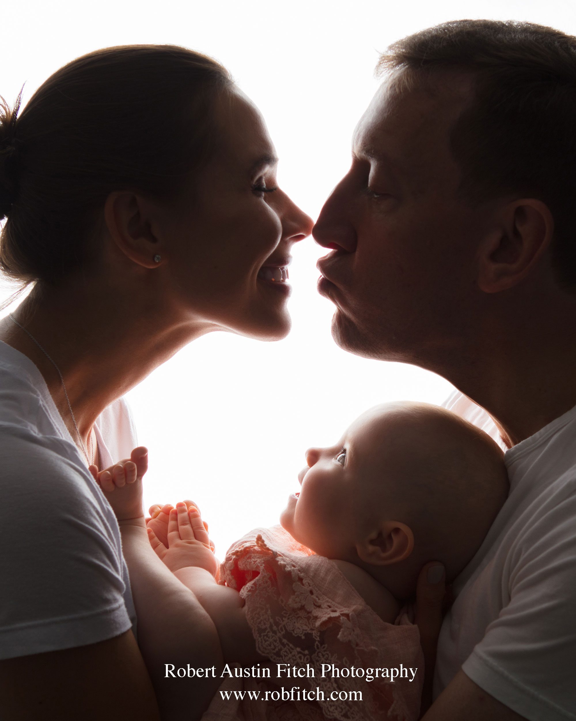 Color silhouette photo couple with baby