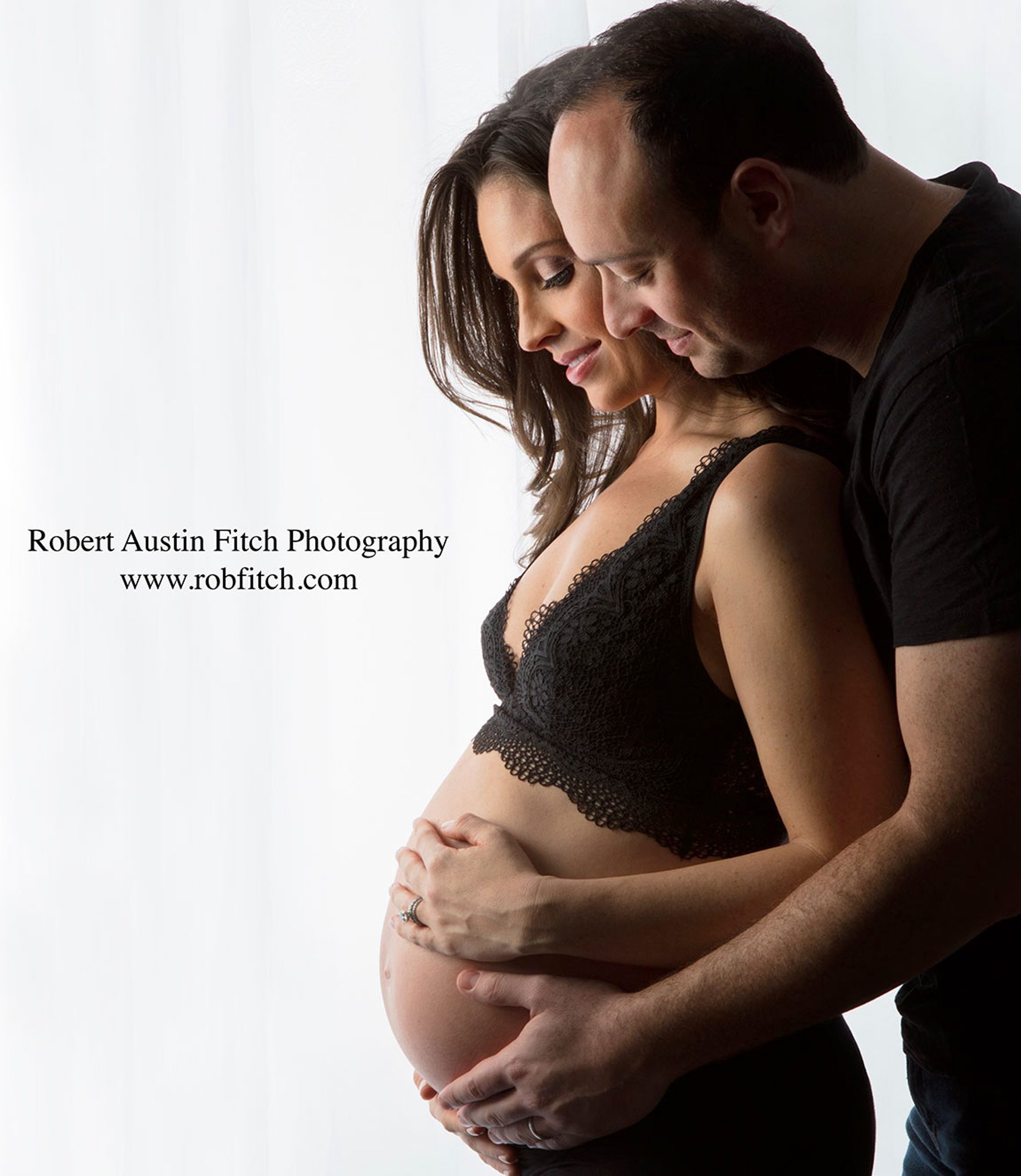 Beautiful color photo of pregnant woman with her husband. 